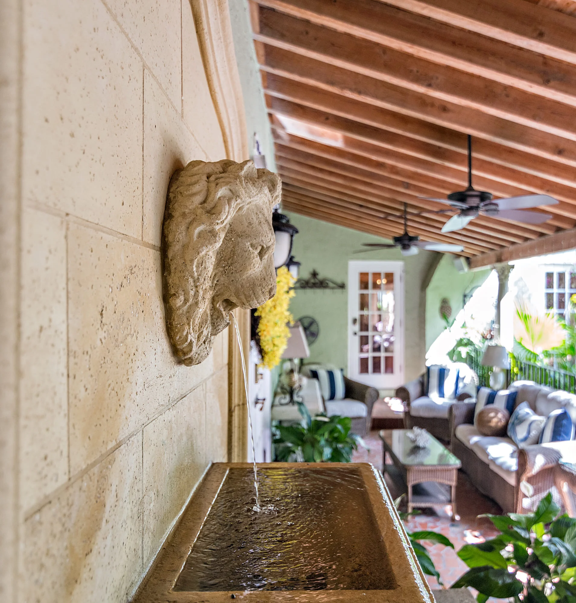 Image of the side of Lion’s Head Fountain on center balcony of Casa Grandview
